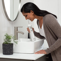 Cordless Pearl Water Flosser + FREE TheraBreath Healthy Gums Oral Rinse!